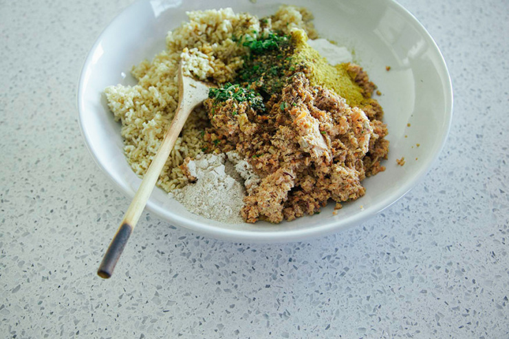 A 3/4 angle shot shows a bowl filled with ingredients for veggie burger patties.