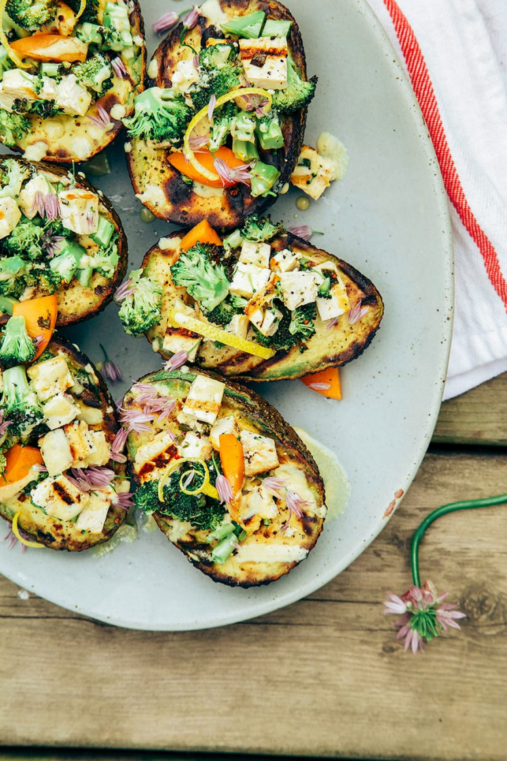charred broccoli + tofu stuffed avocados with sweet lemon curry sauce // the first mess