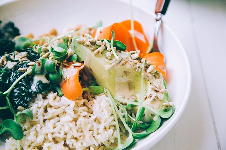 amazing tahini dressing + a healthy grain bowl with kale, chickpeas, brown rice, and carrot.