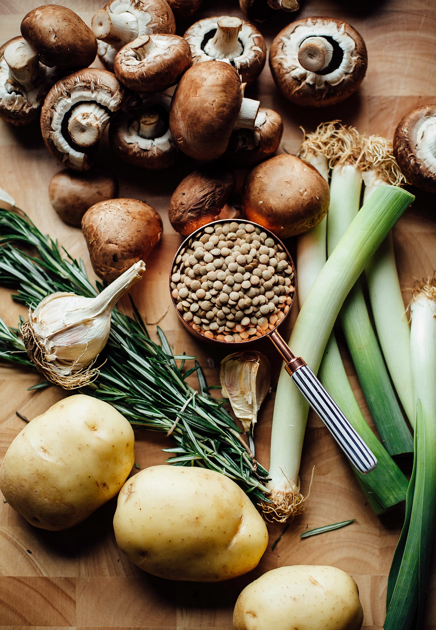 An overhead shot of ingredients for a lentil stew.