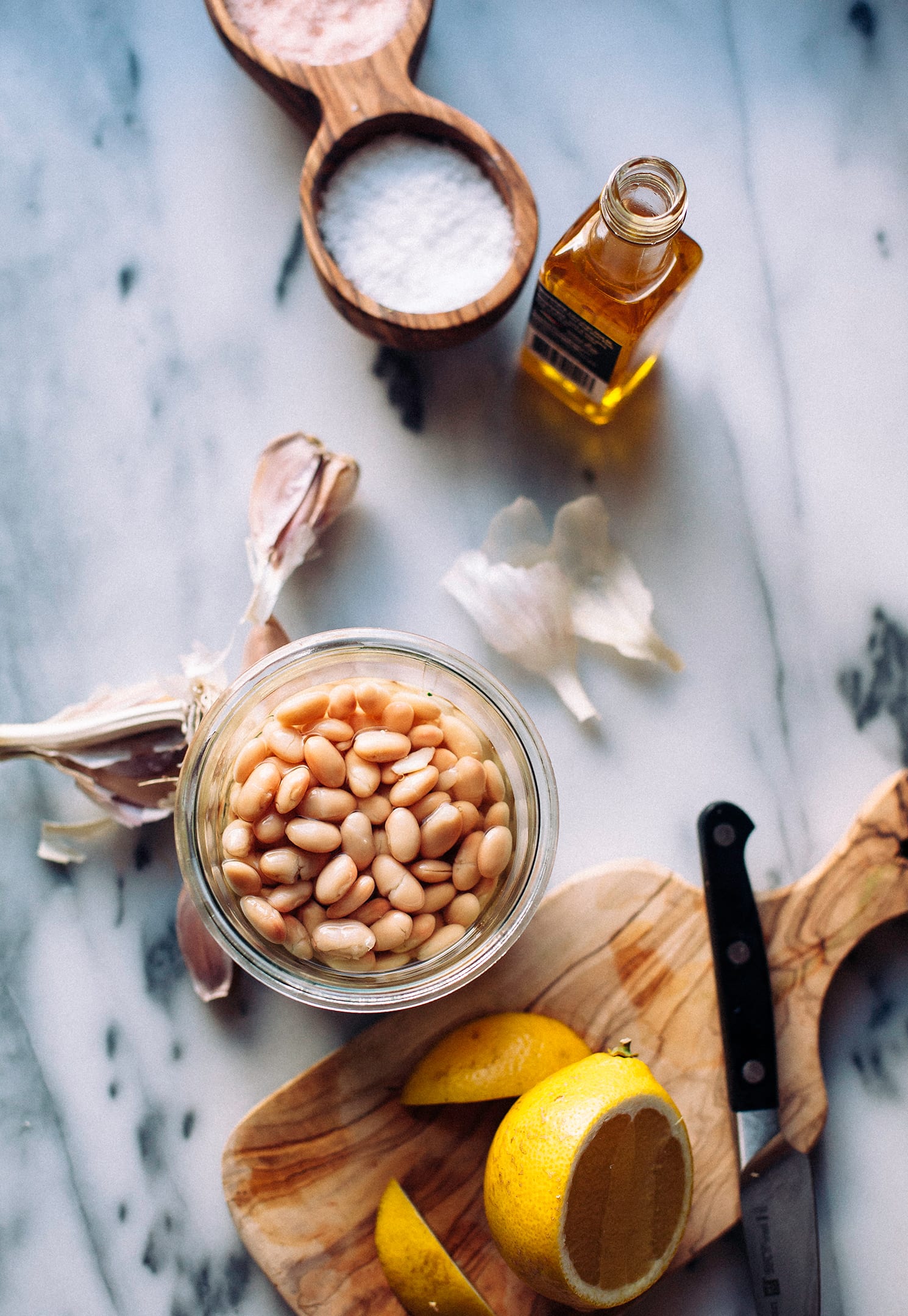 An overhead shot of ingredients for a vegan white sauce for pizza.