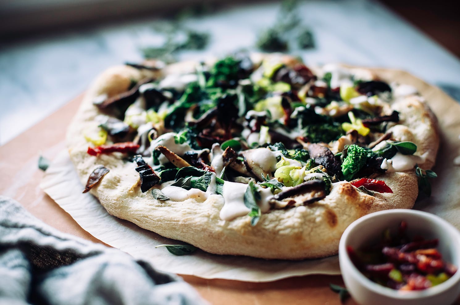 Spicy Vegan White Pizza with Broccoli Rabe & Truffle Cream - The First Mess