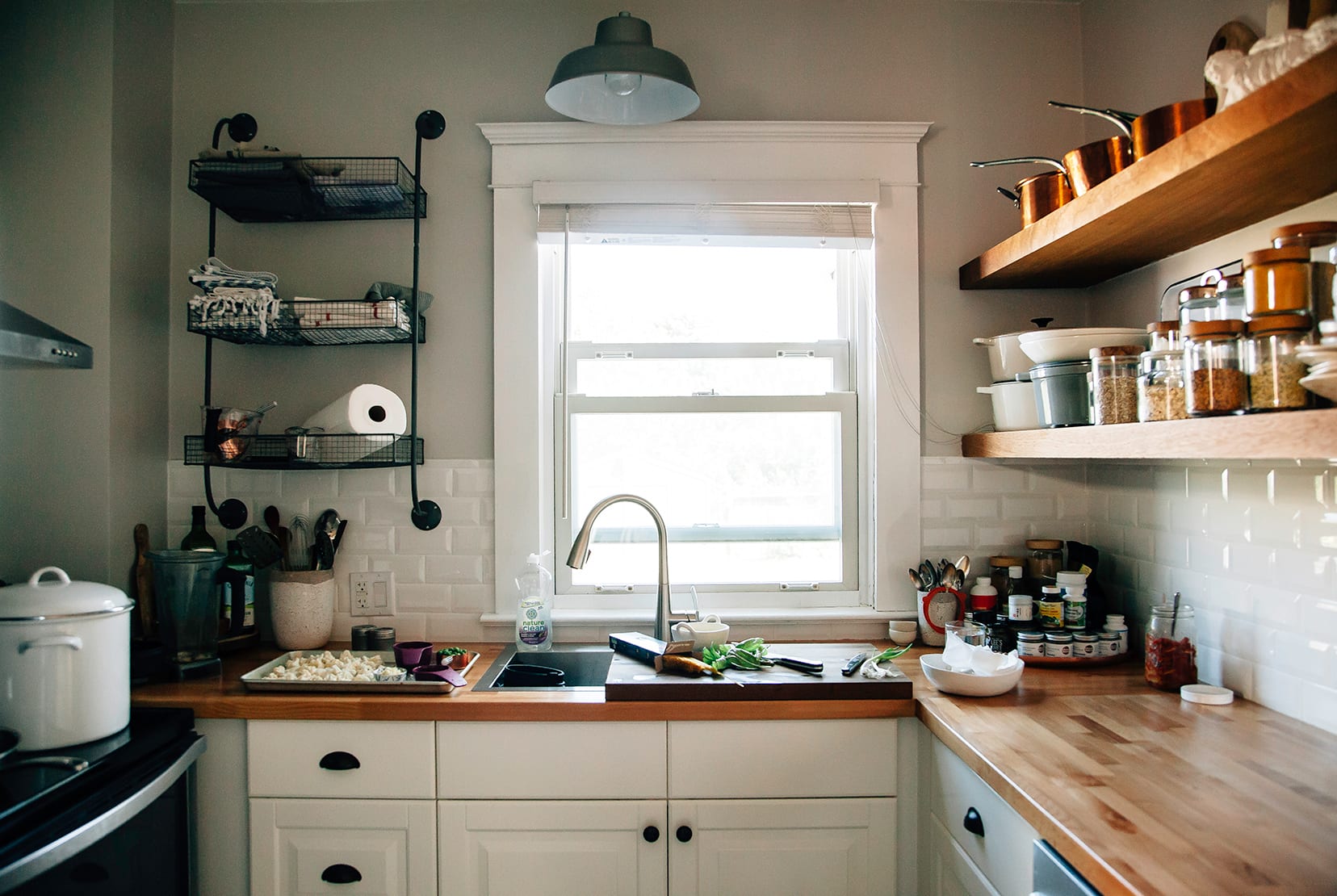 Image shows a well-lit kitchen scene.