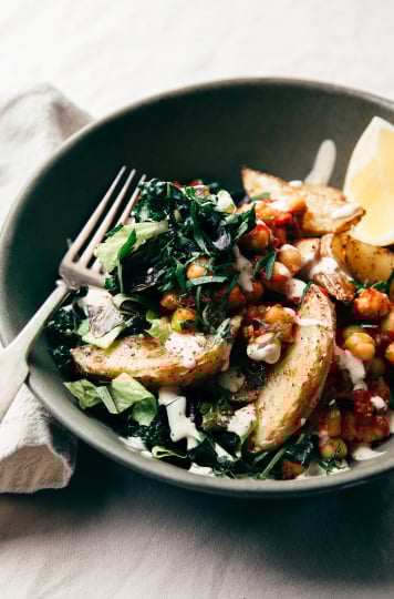 Harissa Chickpea Bowl with Potatoes, Lemon-y Tahini & Greens - The First Mess