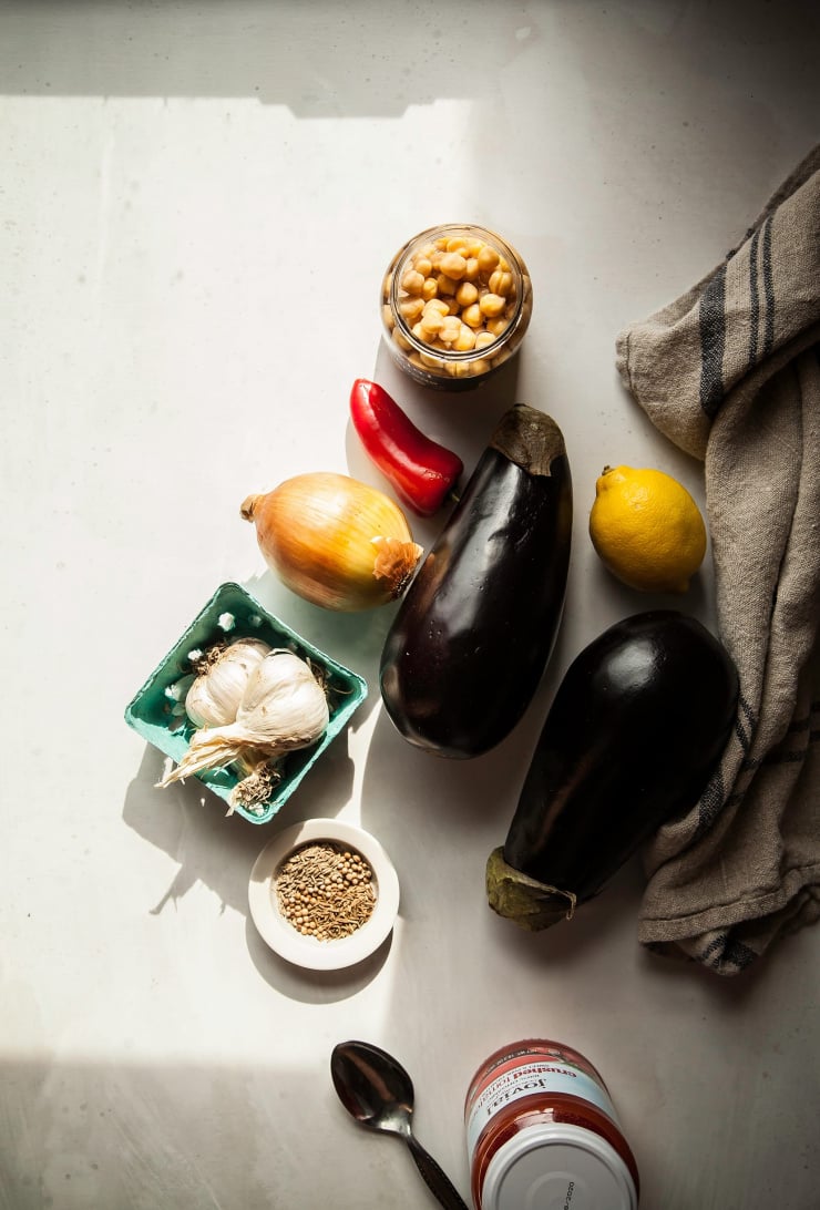 An overhead shot shows ingredients for a vegan stew.