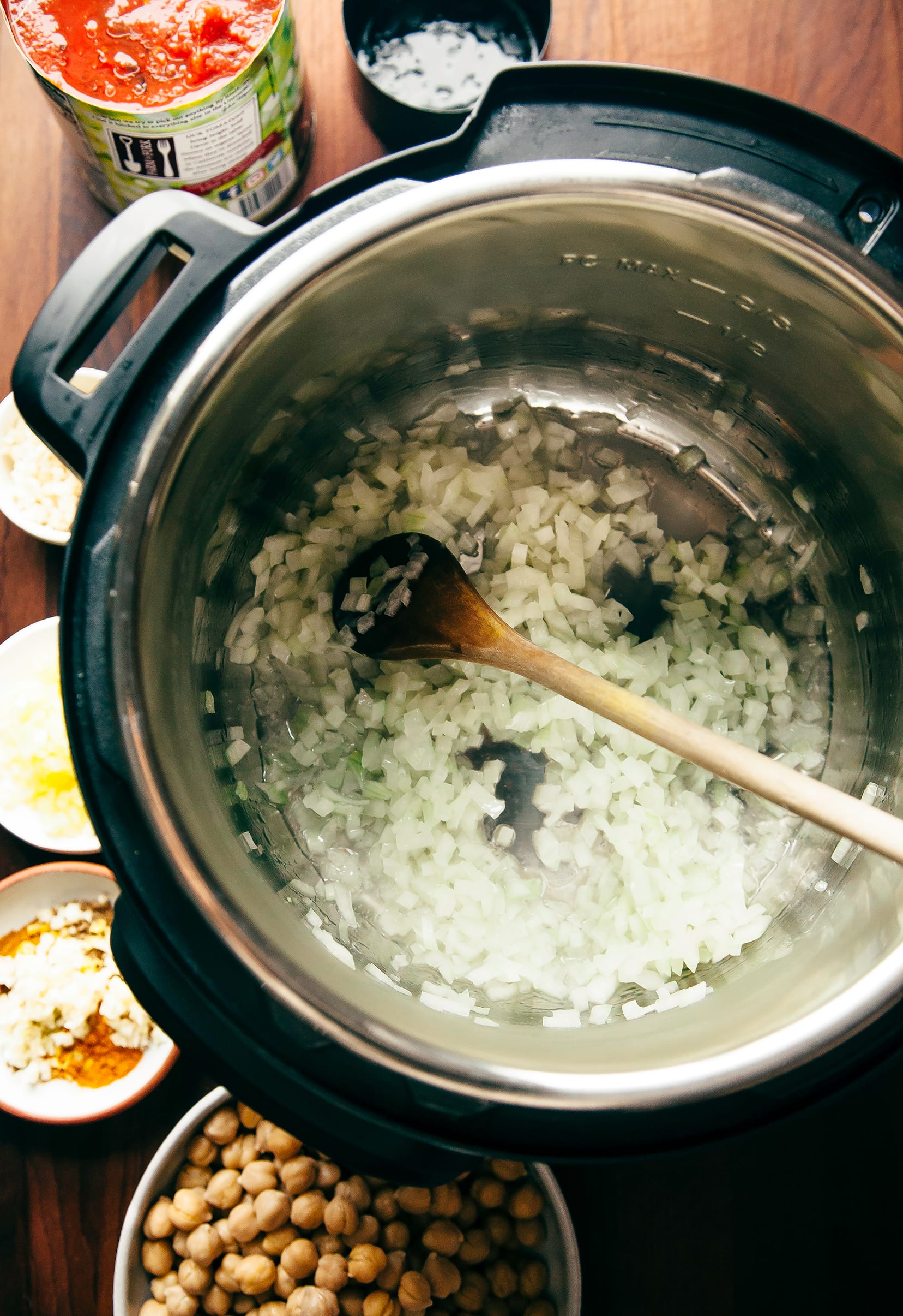 An overhead shot of onions sautéing in an Instant Pot.