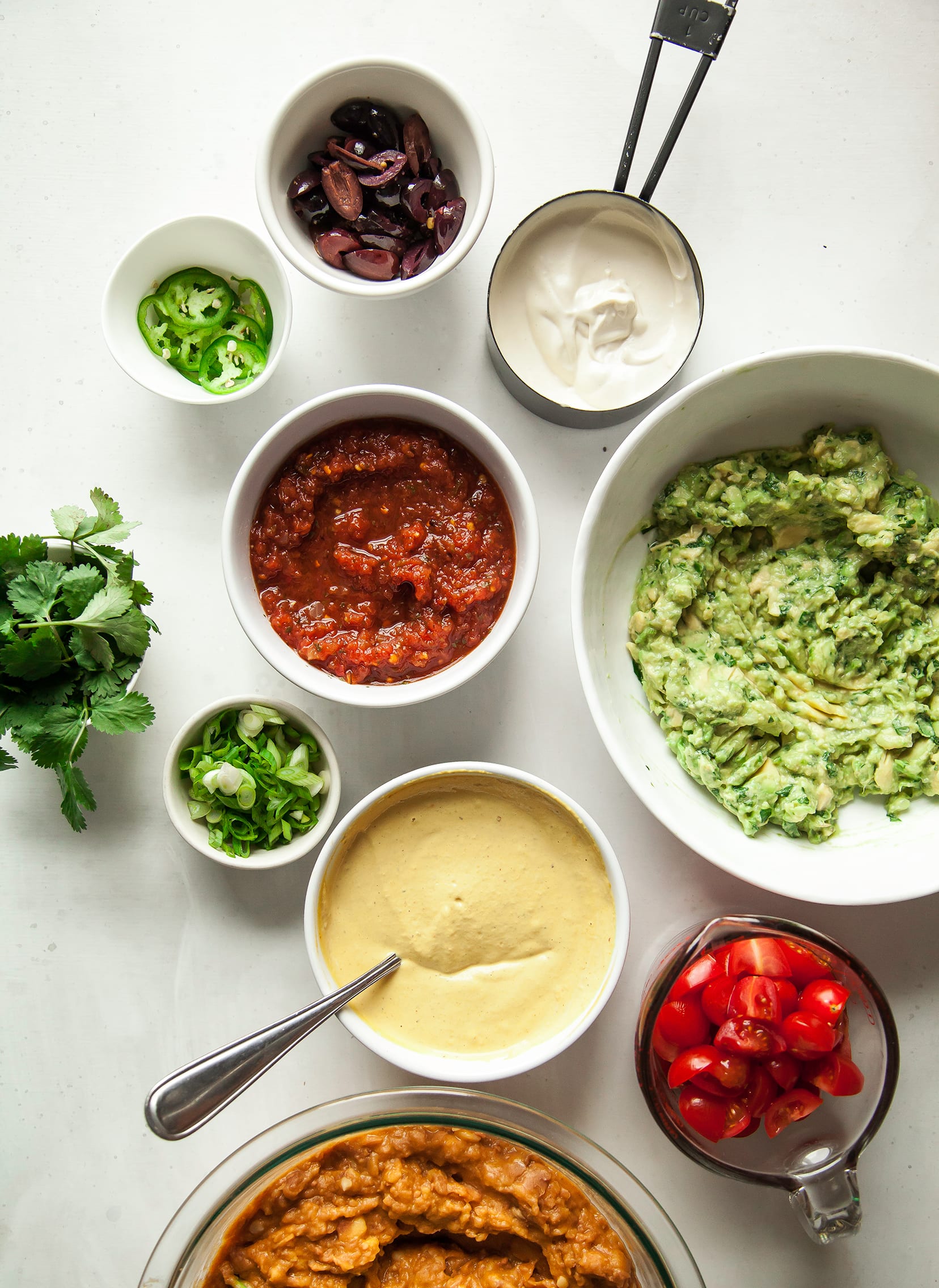 Overhead shot of ingredients used for vegan seven layer dip.
