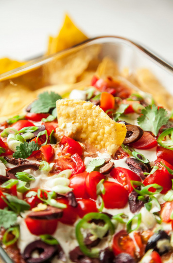 VEGAN SEVEN LAYER DIP W/ BUFFALO REFRIED BEANS - The First Mess