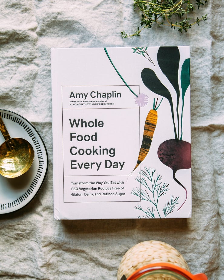 An overhead shot of “Whole Food Cooking Every Day” cookbook by Amy Chaplin