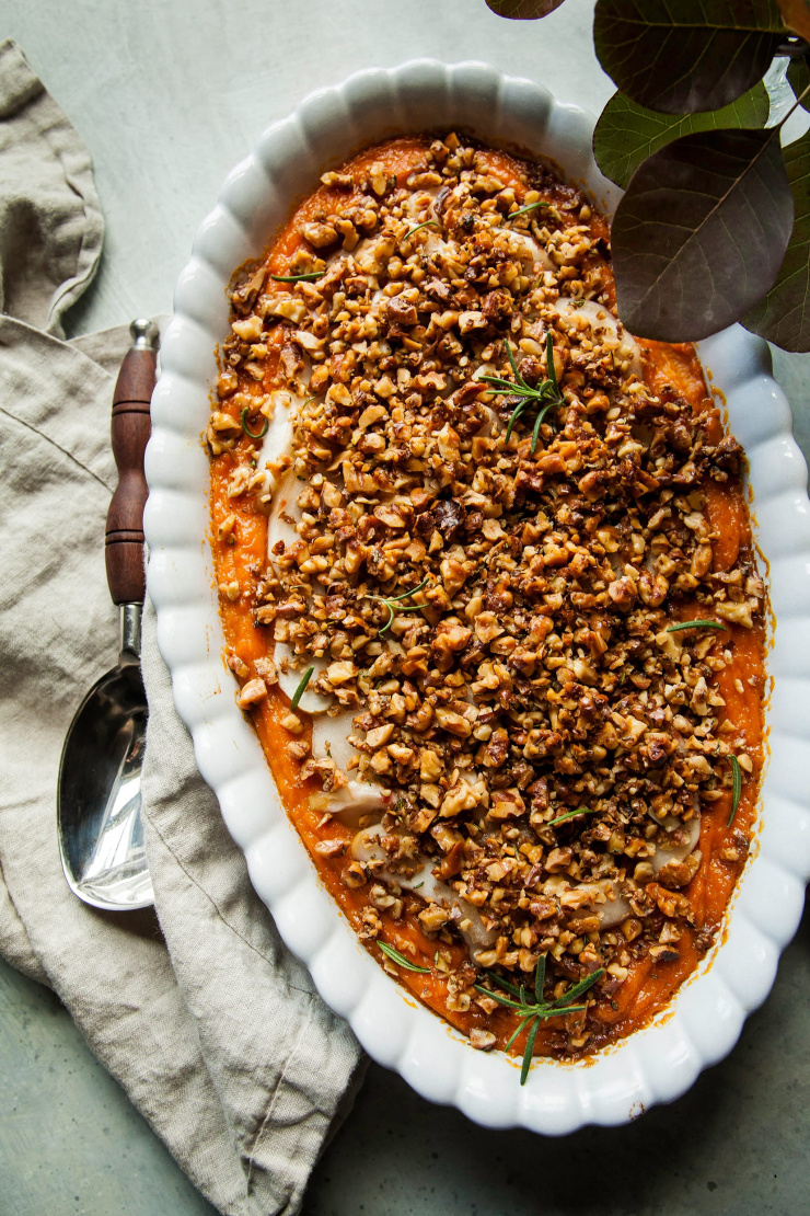 Vegan sweet potato casserole with apples and crunchy rosemary walnuts