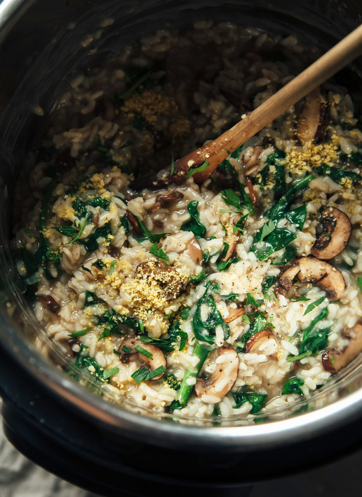An overhead shot of vegan Instant Pot mushroom risotto in an Instant pot insert.
