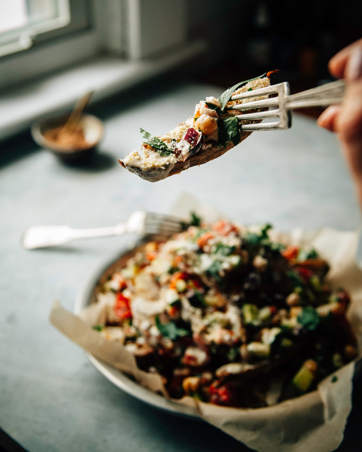 Loaded shawarma-spiced fries with crunchy veg salad and lemony tahini