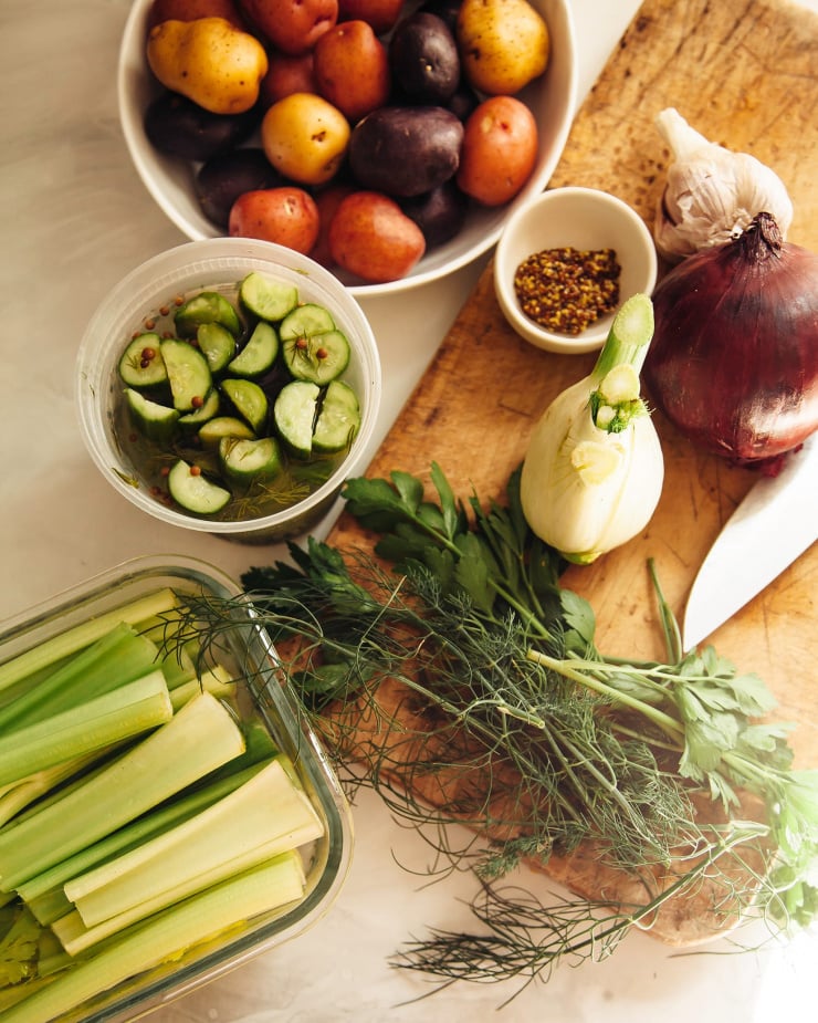 An overhead shot of ingredients for a salad, before chopping and prepping.