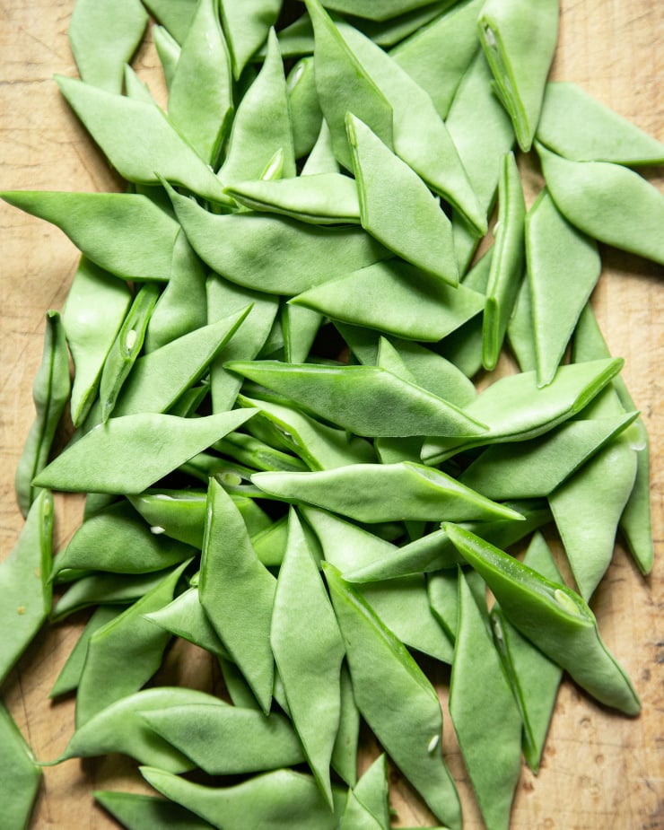 An up close, overhead shot of cut Romano beans.