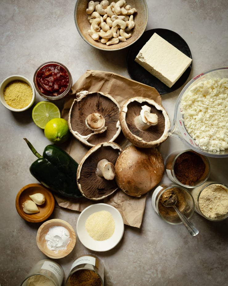 An overhead shot of ingredients for a vegan stuffed mushroom dish.