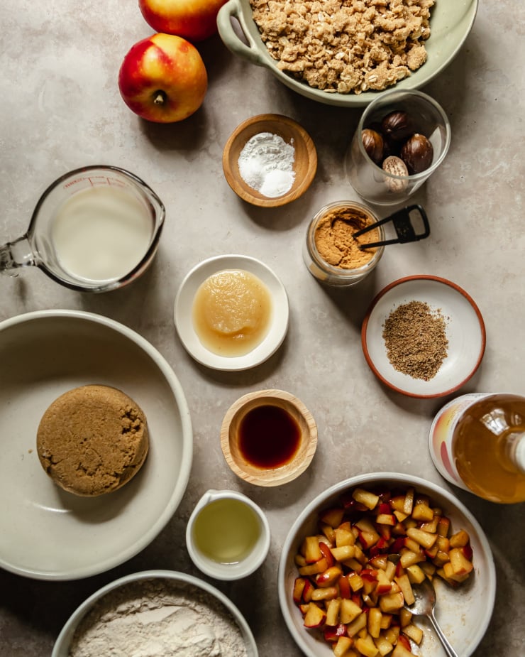An overhead shot of ingredients for vegan apple crips muffins.