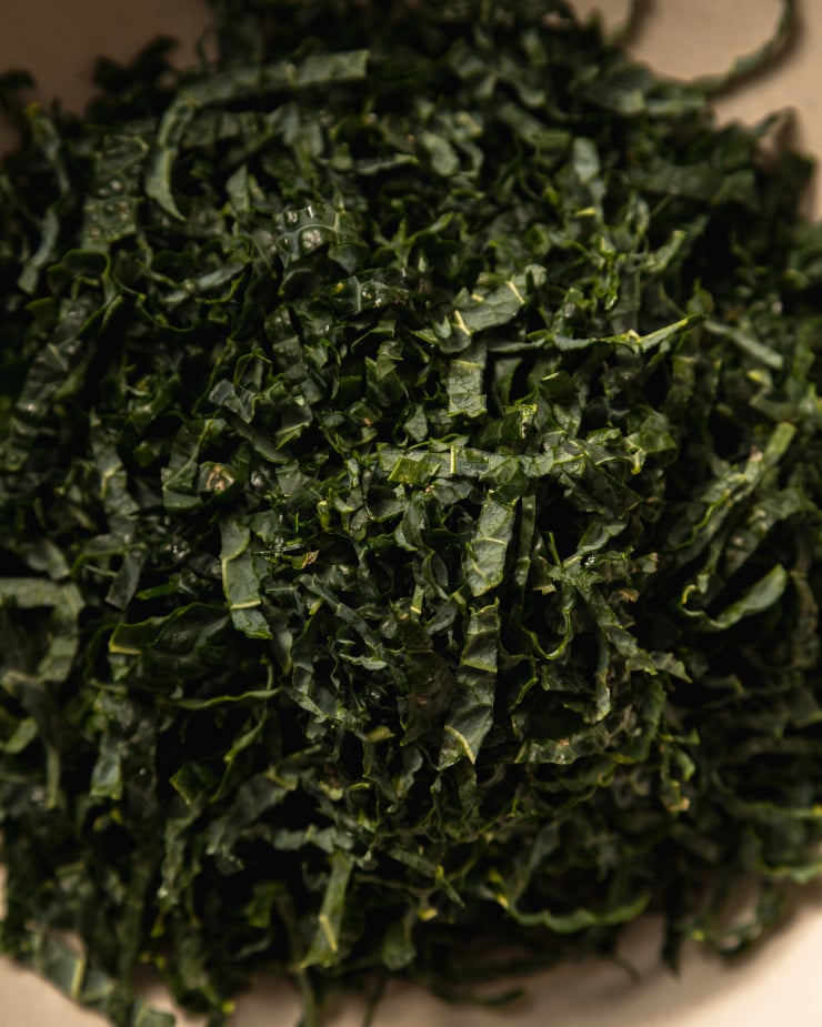 An up close shot of finely sliced kale.
