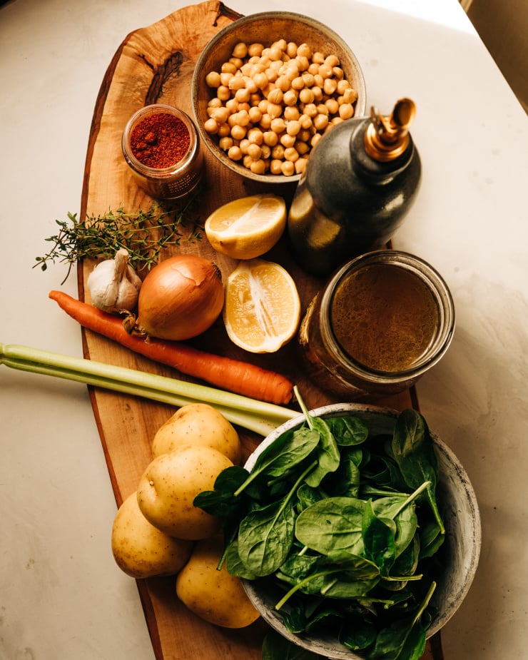 An overhead shot of ingredients on a wooden board.