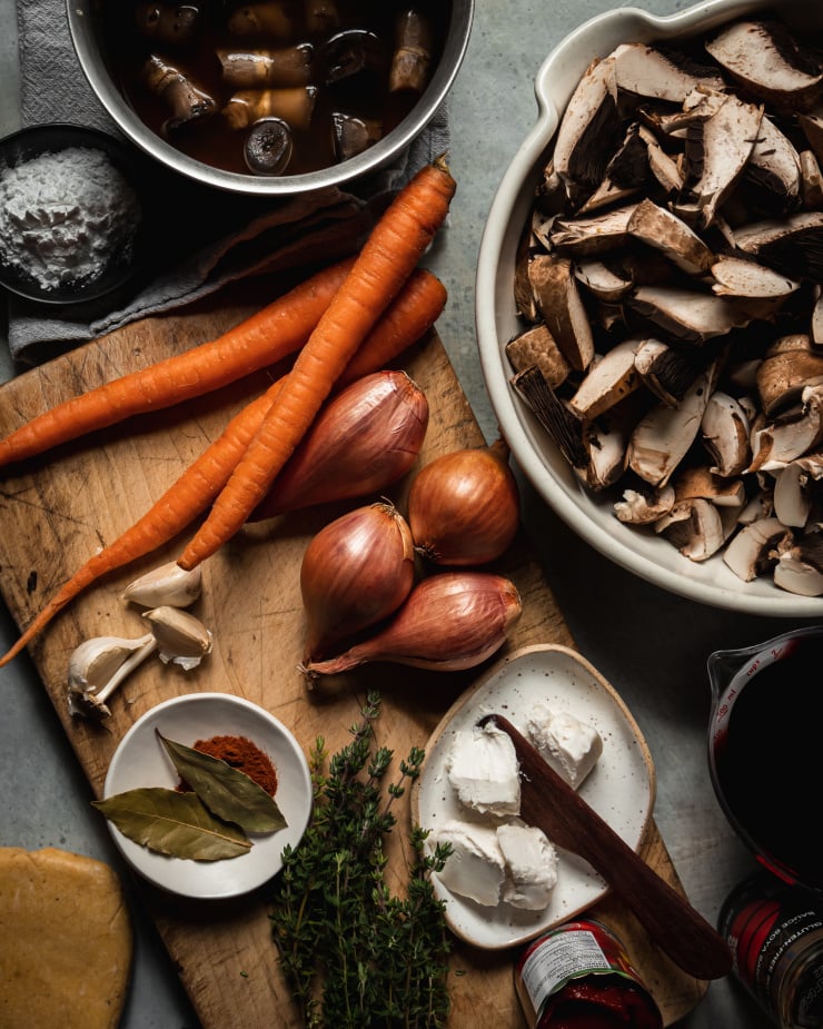 An overhead shot of ingredients used in a vegan mushroom bourguignon pot pie.