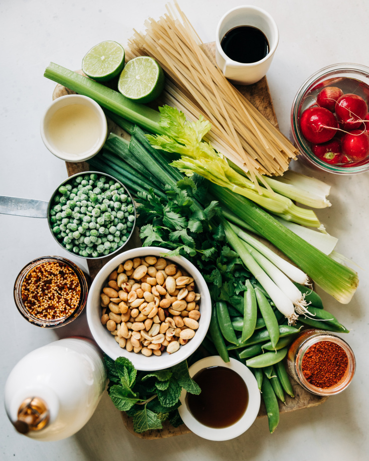 An overhead shot of ingredients used for a Spring-inspired noodle salad.