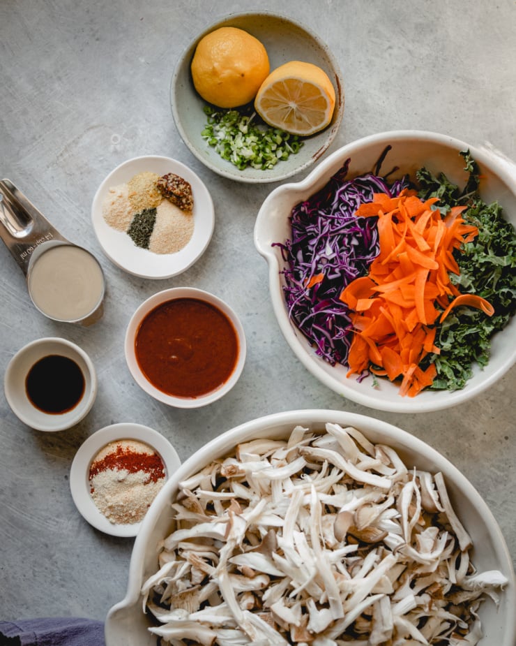 An overhead shot shows the prepped ingredients for BBQ pulled mushroom sandwiches.