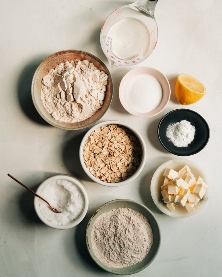 An overhead shot shows measured out ingredients for an oat-y spelt biscuit topping.