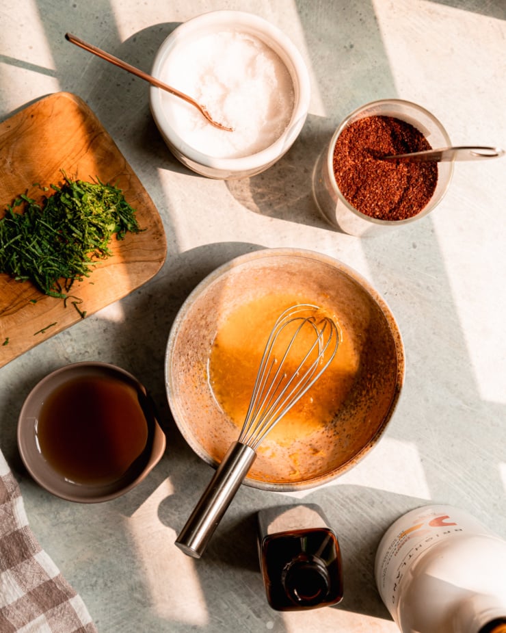 An overhead shot shows ingredients for a fruit salad dressing.