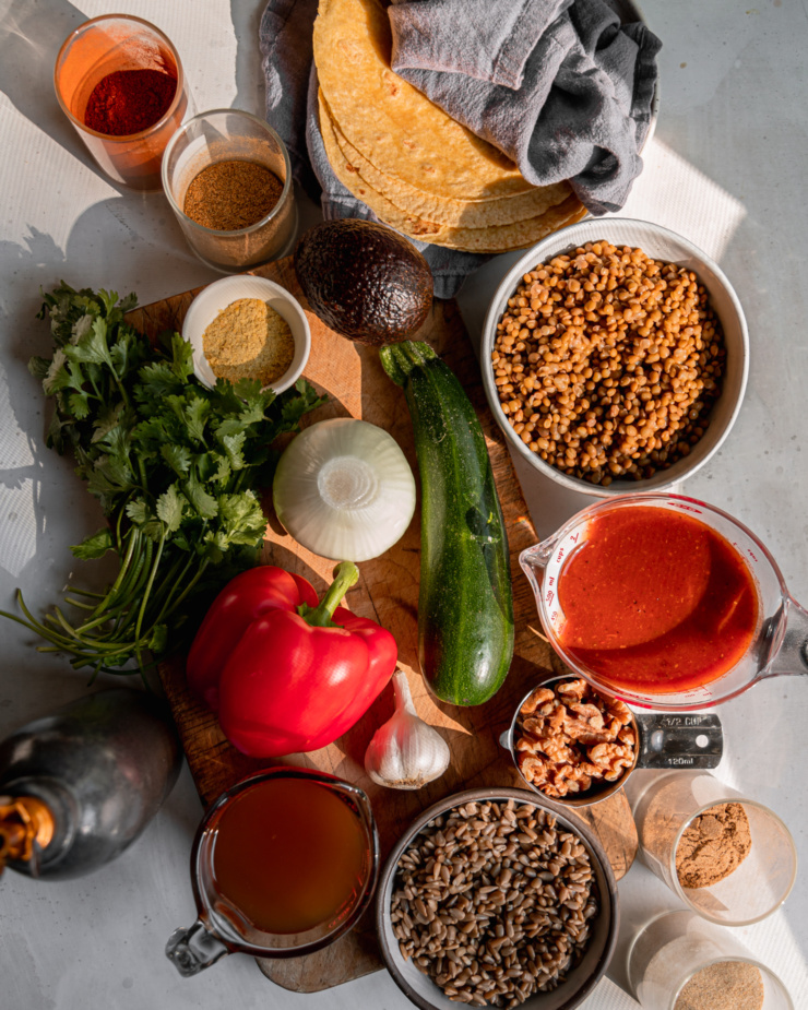 An overhead shot shows ingredients used in a vegan chopped enchilada skillet.