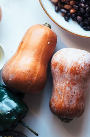 An overhead shot shows two butternut squashes side by side.