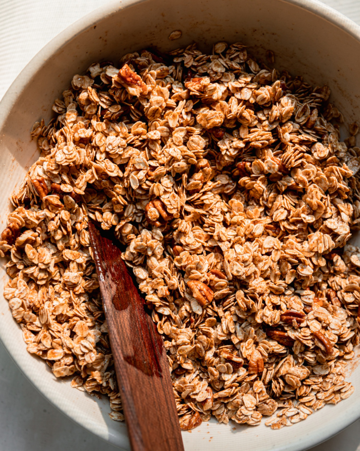 An overhead shot shows some granola mixed up prior to baking.
