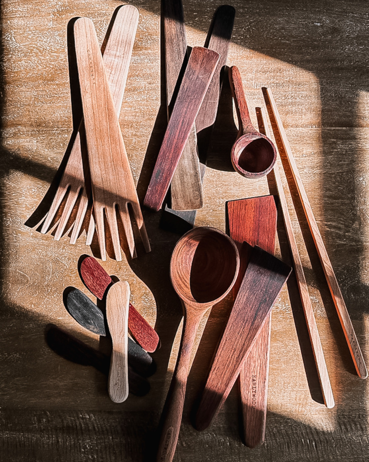 An overhead shot shows an array of wood cooking utensils.