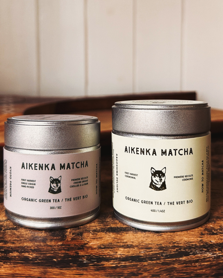 A head-on shot shows two tins ok Aikenka brand matcha.