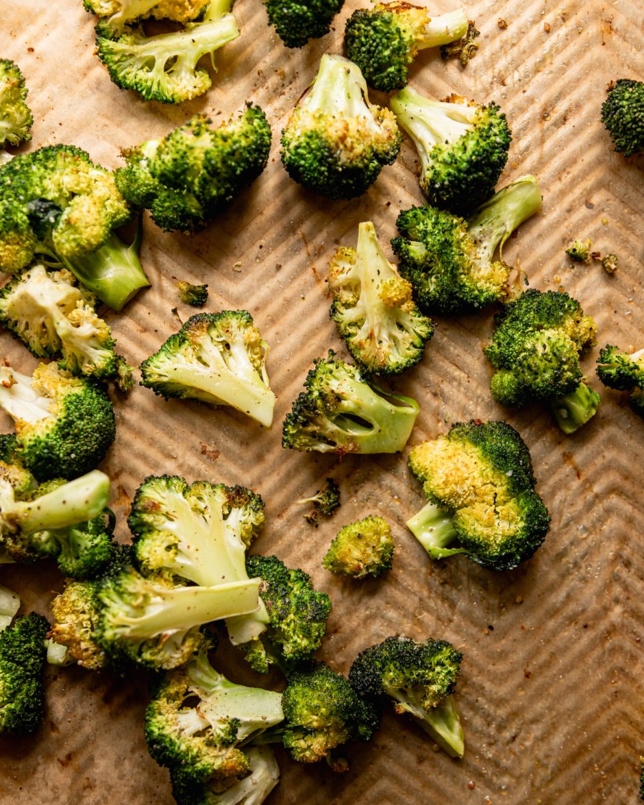 An overhead shot shows lightly browned roasted broccoli florets.
